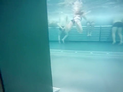 Underwater masturbating and playing with a cock