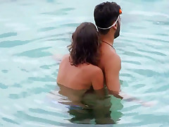 Sex on Greek beach. Handjob under water.
