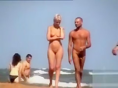 Ravishing angel walks around the beach in the nude