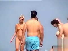 Ravishing angel walks around the beach in the nude