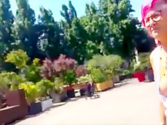 Old woman showing off her big chest