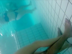 Underwater cams in the pool catch sexy maidens in bikinis fooling around