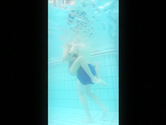 Underwater cams in the pool catch sexy maidens in bikinis fooling around