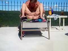 Nudist girl's pussy gets penetrated by the pool