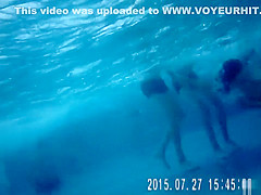 Gorgeous babes fool around with their men in the pool