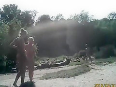 Sunny day at the nudist camp by the river