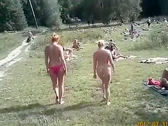 Sunny day at the nudist camp by the river