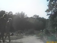 Sunny day at the nudist camp by the river