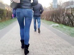 Girl with tight ass is walking down the street