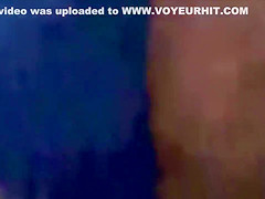 Blonde hussy walks around in a revealing bikini