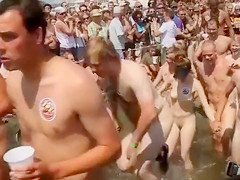 Lots of naked bodies at a nudist race