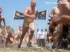 Lots of naked bodies at a nudist race