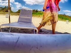 Chubby MILF applies sunscreen to giant melons