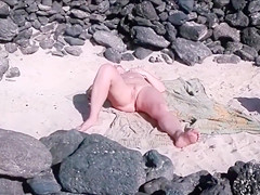 Beach woman has her vagina touched by a stranger