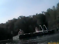 Naked pregnant redhead out on the lake