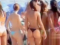 Latina babe with big booty wears a flimsy bikini bottom