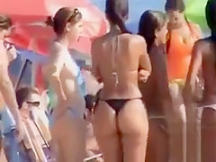 Latina babe with big booty wears a flimsy bikini bottom