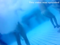 Underwater nudist sex in the public pool