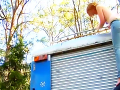Trailer in the forest and redhead beauty