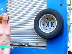 Trailer in the forest and redhead beauty