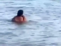 Horny French couple has sex in the water