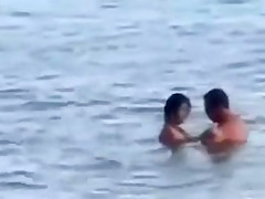Horny French couple has sex in the water