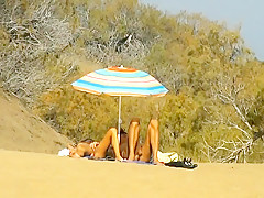 Public pussy fingering at the beach