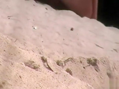 Voyeur man loves filming naked couples at the beach