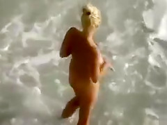 Ukrainian blonde blows and fucks a guy in beach voyeur clip