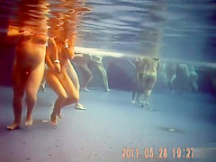 Naughty nudists enjoy banging hard underwater in the pool