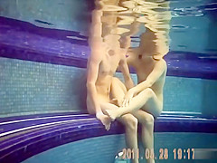 Naughty nudists enjoy banging hard underwater in the pool