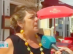 Mature Spanish nudists walk around the beach completely naked