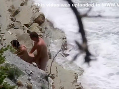 Lazy brunette maid has her wet hole plowed at the beach of Crimea