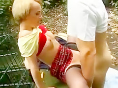 Blonde in chcecked skirt fucked outdoors