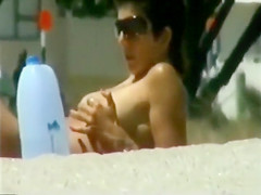 Steamy beach day with a nice natural tits girl