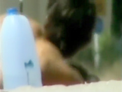 Steamy beach day with a nice natural tits girl