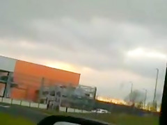 Two girls play in car park