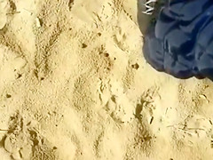 Cumming to a sleeping bikini girl on the beach