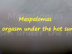 Orgasms on the beach of Maspalomas for a mature couple