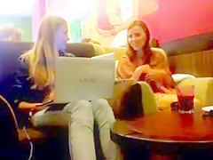 Two girls flash and play in cafe.flv