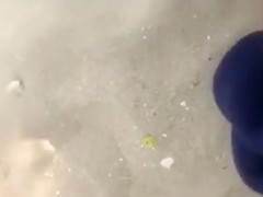 Jerking off a few feet from a bikini girl