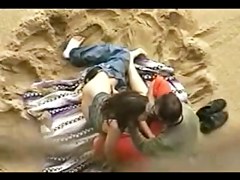 VOYEUR ON THE BEACH 5 young couple