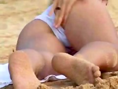 hot flashing blonde at the beach