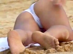 hot flashing blonde at the beach