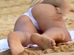 hot flashing blonde at the beach