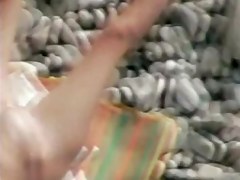 Beach candid camera filmed a horny bimbo