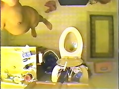 Voyeur spy cam filmed a sexy vixen stripping