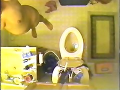 Voyeur spy cam filmed a sexy vixen stripping