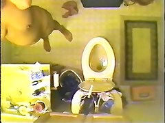 Voyeur spy cam filmed a sexy vixen stripping