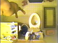 Voyeur spy cam filmed a sexy vixen stripping